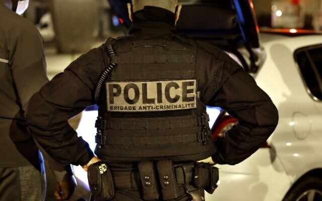 A French police officer of the anti-crime squad, Brigade Anti-Criminalite de nuit (BAC N 75) is seen in Paris, on October 16, 2020. (Thomas Coex/AFP) A French police officer of the anti-crime squad, Brigade Anti-Criminalite de nuit (BAC N 75) is seen in Paris, on October 16, 2020. (Thomas Coex/AFP)