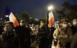 People attend the 'Marche Blanche' in Conflans-Sainte-Honorine, northwest of Paris, on October 20, 2020, in solidarity after a teacher was beheaded for showing pupils cartoons of the Prophet Muhammad. (Photo by Bertrand GUAY / AFP)
