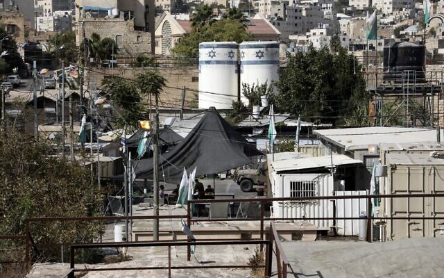 Israeli soldiers in the West Bank city of Hebron, October 27, 2020. (HAZEM BADER/AFP) Israeli soldiers in the West Bank city of Hebron, October 27, 2020. (HAZEM BADER/AFP)