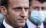 French President Emmanuel Macron (L) speaks to the press as Nice's mayor Christian Estrosi (R) listens outside the the Notre-Dame de l'Assomption Basilica in Nice on October 29, 2020 after a jihadist attack in the city. (Eric Gaillard/POOL/AFP)