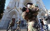 French soldiers secure the Notre-Dame de l'Assomption Basilica in Nice on October 30, 2020 during a tribute to the victims killed by a knife attacker the day before. (Valery Hache/AFP)