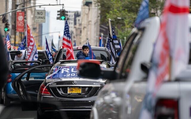 People participate in a march and rally for President Donald Trump on 5th Avenue on October 25, 2020 in New York City. (David Dee Delgado/Getty Images/AFP) People participate in a march and rally for President Donald Trump on 5th Avenue on October 25, 2020 in New York City. (David Dee Delgado/Getty Images/AFP)