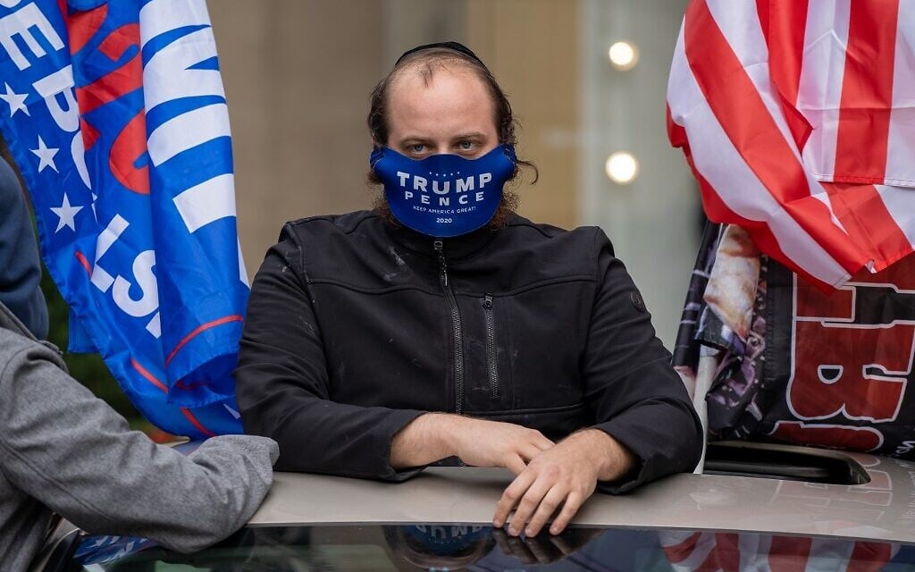 A person participates in a march and rally for President Donald Trump on 5th Avenue on October 25, 2020 in New York City. (David Dee Delgado/Getty Images/AFP)