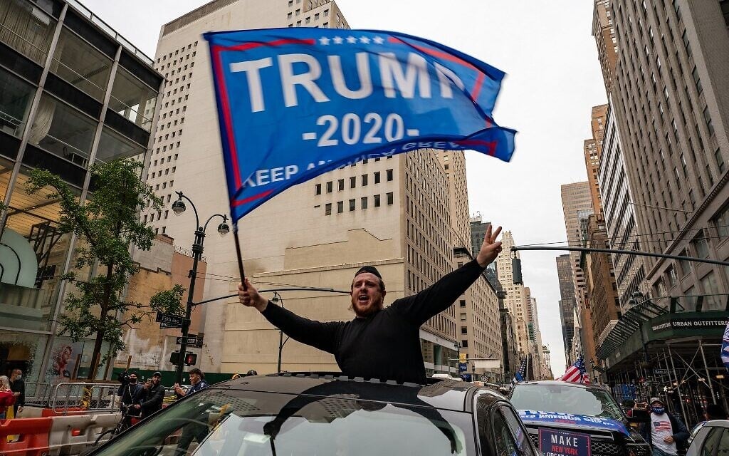 A person participates in a march and rally for US President Donald Trump on 5th Avenue on October 25, 2020, in New York City. (David Dee Delgado/Getty Images/AFP)
