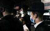 Illustrative: Young members of the Hasidic community gather in the Brooklyn neighborhood of Borough Park to denounce lockdowns of their neighborhood due to a spike in COVID-19 cases on October 7, 2020, in New York City. (Spencer Platt/Getty Images/AFP)