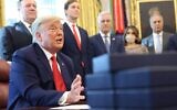 President Donald Trump speaks about a Sudan-Israel peace agreement, in the Oval Office on October 23, 2020 in Washington, DC. Jared Kushner is behind him (Win McNamee/Getty Images/AFP