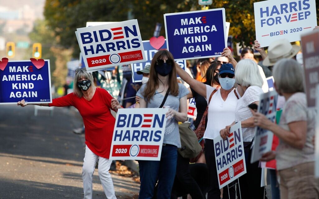 Illustrative: Supporters of Democratic Presidential candidate and former US Vice President Joe Biden show their support before the vice presidential debate outside Kingsbury Hall at the University of Utah in Salt Lake City, Utah on October 7, 2020. (George Frey AFP via Getty Images/ via JTA)