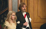 A still of Sacha Baron Cohen and actress Maria Bakalova, who plays his daughter, from 'Borat Subsequent Moviefilm: Delivery of Prodigious Bribe to American Regime for Make Benefit Once Glorious Nation of Kazakhstan.' (Courtesy Amazon)