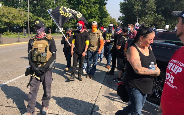 Members of the far-right Proud Boys in Salem, Oregon, on September 7, 2020, for a pro-Trump rally at the state capitol. (AP Photo/Andrew Selsky) Members of the far-right Proud Boys in Salem, Oregon, on September 7, 2020, for a pro-Trump rally at the state capitol. (AP Photo/Andrew Selsky)