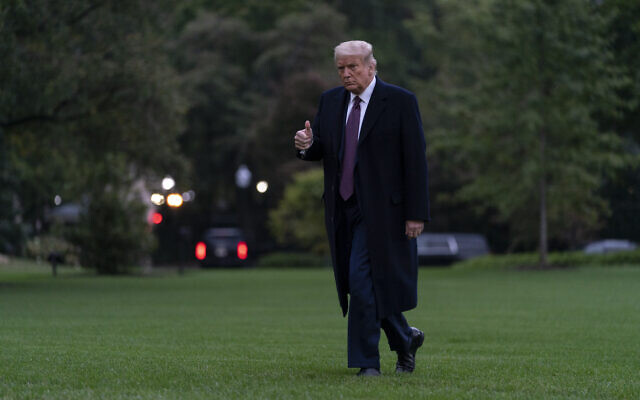 US President Donald Trump gives the thumbs-up as he walks from Marine One to the White House in Washington, October 1, 2020, as he returns from Bedminster, New Jersey. (AP Photo/Carolyn Kaster) US President Donald Trump gives the thumbs-up as he walks from Marine One to the White House in Washington, October 1, 2020, as he returns from Bedminster, New Jersey. (AP Photo/Carolyn Kaster)