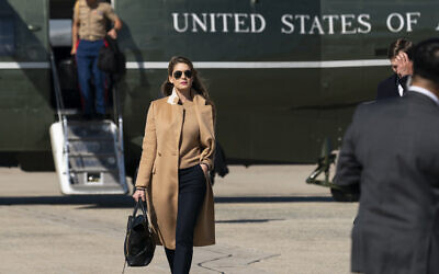 Counselor to the US President Hope Hicks walks from Marine One to accompany US President Donald Trump aboard Air Force One as he departs on September 30, 2020, at Andrews Air Force Base, Maryland. (AP Photo/Alex Brandon)