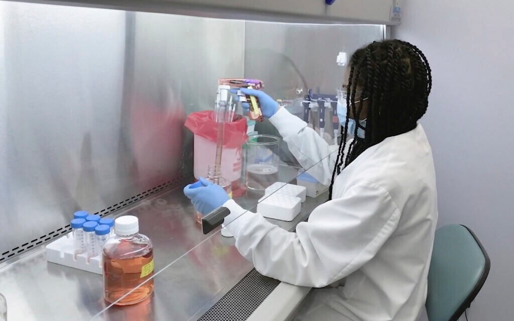 Illustrative: In this undated image from video provided by Regeneron Pharmaceuticals on Friday, October 2, 2020, a scientist works in the company's Infectious Disease Lab in New York state, for efforts on an experimental coronavirus antibody drug. (Regeneron via AP)