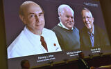 The 2020 Nobel laureates in Physiology or Medicine are announced during a news conference at the Karolinska Institute in Stockholm, Sweden, Monday Oct. 5, 2020. The prize has been awarded jointly to Harvey J. Alter, left on screen, Michael Houghton, center, and Charles M. Rice for the discovery of the Hepatitis C virus. (Claudio Bresciani/TT via AP)