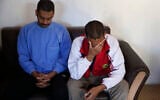 In this March 30, 2019, file photo, Alexanda Amon Kotey, left, and El Shafee Elsheikh, who were allegedly among four British jihadis who made up a brutal Islamic State cell dubbed "The Beatles," speak during an interview with The Associated Press at a security center in Kobani, Syria.(AP Photo/Hussein Malla, File)