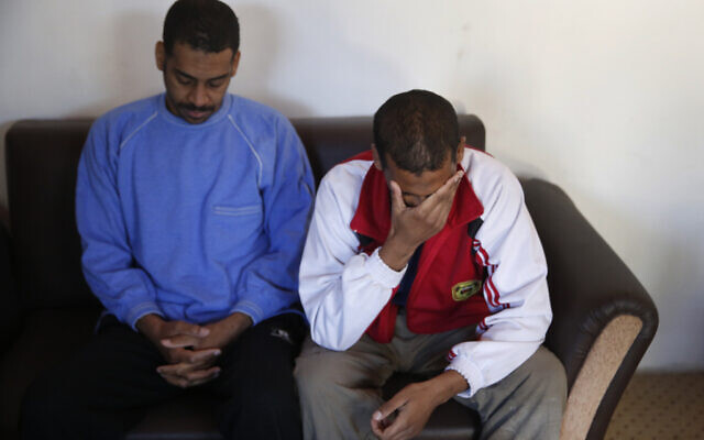 In this March 30, 2019, file photo, Alexanda Amon Kotey, left, and El Shafee Elsheikh, who were allegedly among four British jihadis who made up a brutal Islamic State cell dubbed "The Beatles," speak during an interview with The Associated Press at a security center in Kobani, Syria.(AP Photo/Hussein Malla, File) In this March 30, 2019, file photo, Alexanda Amon Kotey, left, and El Shafee Elsheikh, who were allegedly among four British jihadis who made up a brutal Islamic State cell dubbed "The Beatles," speak during an interview with The Associated Press at a security center in Kobani, Syria.(AP Photo/Hussein Malla, File)