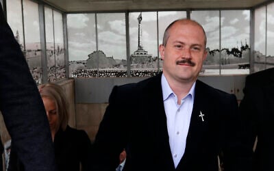 Marian Kotleba, chairman of the far-right People's Party Our Slovakia, walks to arrive at the Supreme Court in Bratislava, Slovakia, on February 29, 2020. (AP Photo/Petr David Josek)
