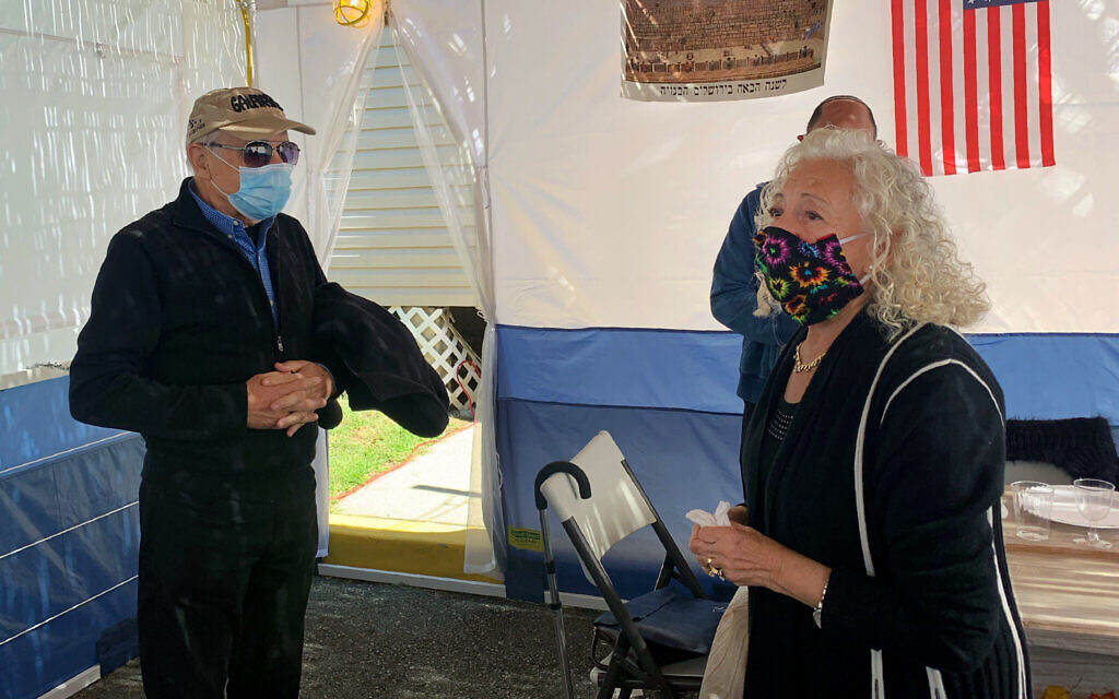 Holocaust survivors Israel "Sasha" Eisenberg, left, and Ruth Brandspiegel are reunited on October 3, 2020, in East Brunswick, New Jersey for the first time in more than 70 years since their families left the Hallein Displaced Persons Camp in Austria. (Larry Brandspiegel via AP) Holocaust survivors Israel "Sasha" Eisenberg, left, and Ruth Brandspiegel are reunited on October 3, 2020, in East Brunswick, New Jersey for the first time in more than 70 years since their families left the Hallein Displaced Persons Camp in Austria. (Larry Brandspiegel via AP)