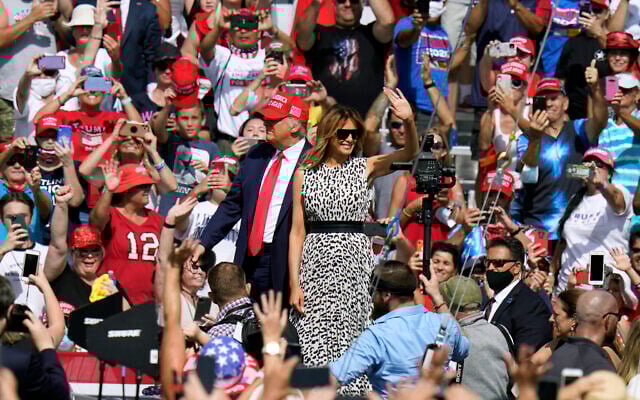 President Donald Trump and first lady Melania Trump arrive for a campaign rally on October 29, 2020, in Tampa, Fla. (AP/Chris O'Meara) President Donald Trump and first lady Melania Trump arrive for a campaign rally on October 29, 2020, in Tampa, Fla. (AP/Chris O'Meara)