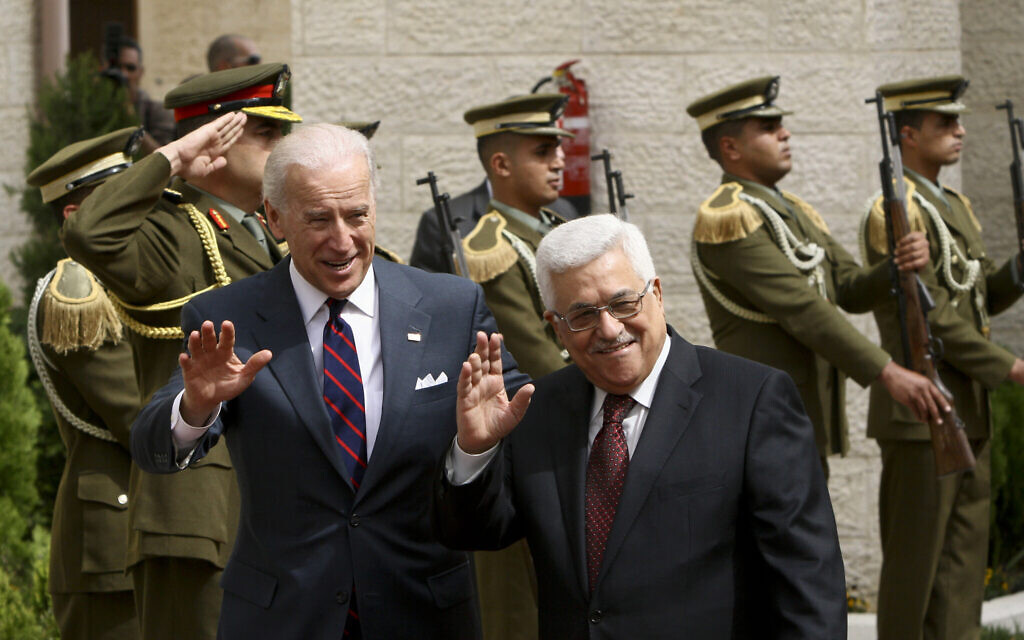 US Vice President Joseph Biden, left, and Palestinian Authority President Mahmoud Abbas wave to the press ahead of their meeting in the West Bank city of Ramallah, March 10, 2010. (AP Photo/Tara Todras-Whitehill) US Vice President Joseph Biden, left, and Palestinian Authority President Mahmoud Abbas wave to the press ahead of their meeting in the West Bank city of Ramallah, March 10, 2010. (AP Photo/Tara Todras-Whitehill)