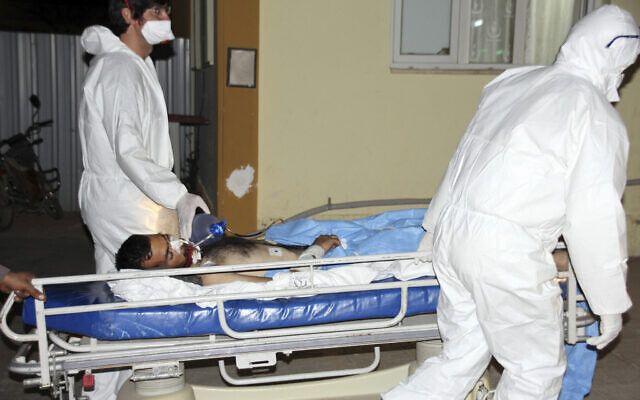In this photo taken on April 4, 2017 and made available April 5, Turkish experts carry a victim of alleged chemical weapons attacks in Syrian city of Idlib, at a local hospital in Reyhanli, Turkey (IHA via AP) In this photo taken on April 4, 2017 and made available April 5, Turkish experts carry a victim of alleged chemical weapons attacks in Syrian city of Idlib, at a local hospital in Reyhanli, Turkey (IHA via AP)
