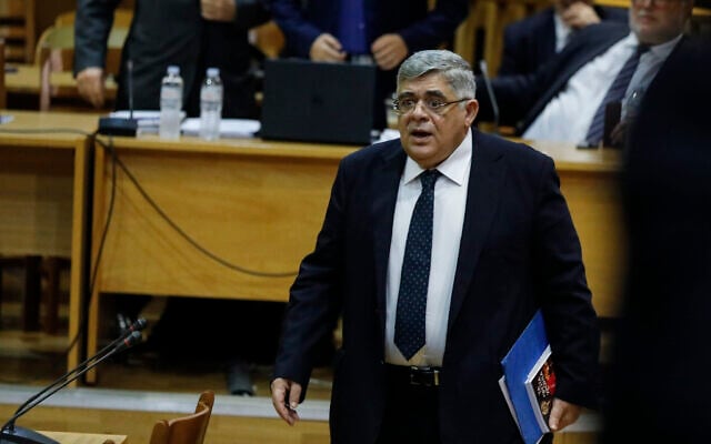 Head of Greece's extreme far-right Golden Dawn party Nikos Michaloliakos arrives to testify, in the Court of Athens, November 6, 2019. (Petros Giannakouris/AP) Head of Greece's extreme far-right Golden Dawn party Nikos Michaloliakos arrives to testify, in the Court of Athens, November 6, 2019. (Petros Giannakouris/AP)