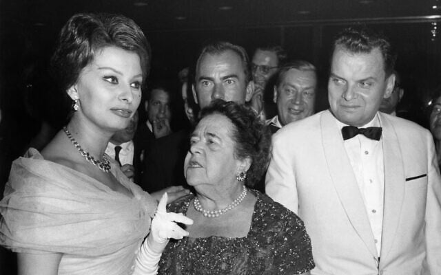 Picture taken on July 4, 1959 shows Italian actress Sophia Loren, American journalist Elsa Maxwell and festival director Dr. Alfred Bauer, right, at the festival in the Palais am Funkturm in Berlin. (Konrad Giehr/dpa via AP, file) Picture taken on July 4, 1959 shows Italian actress Sophia Loren, American journalist Elsa Maxwell and festival director Dr. Alfred Bauer, right, at the festival in the Palais am Funkturm in Berlin. (Konrad Giehr/dpa via AP, file)
