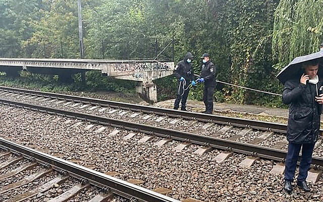 Investigators work at the scene where a US embassy employee who was found with unconscious with a head injury near railways tracks in Kyiv, Ukraine, September 30, 2020. She later died of her injuries. (Ministry of Internal Affairs of Ukraine via AP) Investigators work at the scene where a US embassy employee who was found with unconscious with a head injury near railways tracks in Kyiv, Ukraine, September 30, 2020. She later died of her injuries. (Ministry of Internal Affairs of Ukraine via AP)