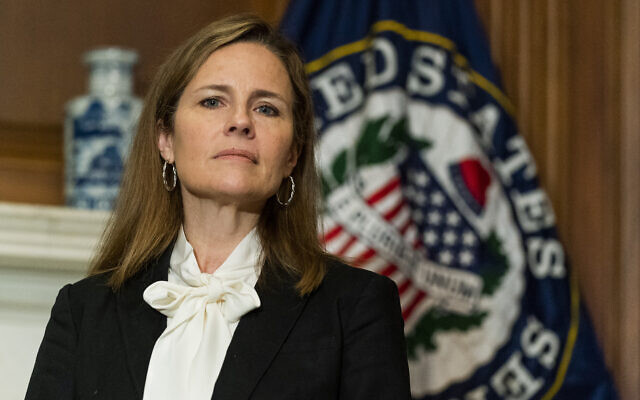 US Supreme Court nominee Judge Amy Coney Barrett listens as Republican Senator Jerry Moran on Kansas, not shown, speaks during their meeting on Capitol Hill, October 1, 2020, in Washington. (AP Photo/Manuel Balce Ceneta, POOL) US Supreme Court nominee Judge Amy Coney Barrett listens as Republican Senator Jerry Moran on Kansas, not shown, speaks during their meeting on Capitol Hill, October 1, 2020, in Washington. (AP Photo/Manuel Balce Ceneta, POOL)