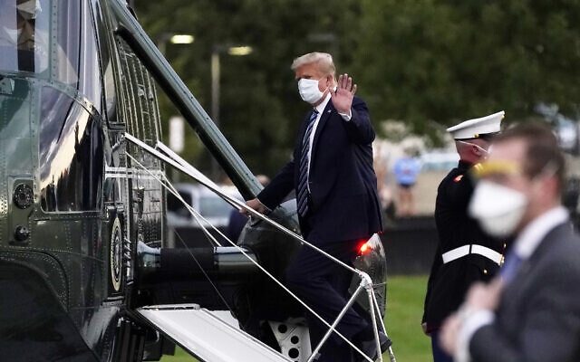 President Donald Trump boards Marine One to return to the White House after receiving treatments for covid-19 at Walter Reed National Military Medical Center, Monday, Oct. 5, 2020, in Bethesda, Md. (AP Photo/Evan Vucci) President Donald Trump boards Marine One to return to the White House after receiving treatments for covid-19 at Walter Reed National Military Medical Center, Monday, Oct. 5, 2020, in Bethesda, Md. (AP Photo/Evan Vucci)