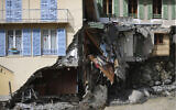 A damaged house is pictured after floods in Saint-Martin-Vesubie, southeastern France, Oct.6, 2020 (AP Photo/Daniel Cole)