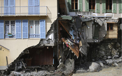 A damaged house is pictured after floods in Saint-Martin-Vesubie, southeastern France, Oct.6, 2020 (AP Photo/Daniel Cole)