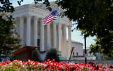 The US Supreme Court is seen in Washington, Tuesday, Oct. 6, 2020, as the justices continue arguments in a new term without their colleague, the late Justice Ruth Bader Ginsburg. (AP Photo/J. Scott Applewhite)