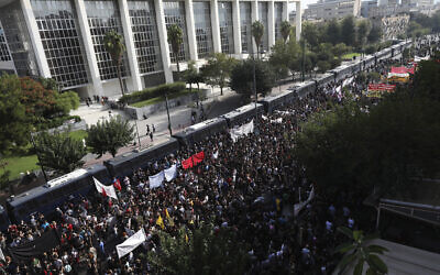 Thousands of people gather for a protest outside a court as it delivered a landmark verdict in the marathon, five-year-long trial against the country's extreme right-wing Golden Dawn party,  in Athens, October 7, 2020. (Yorgos Karahalis/AP)