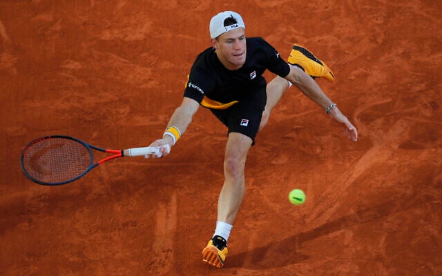 Argentina's Diego Schwartzman plays a shot against Spain's Rafael Nadal in the semifinal match of the French Open tennis tournament at the Roland Garros stadium in Paris, France, Oct. 9, 2020. (AP Photo/Christophe Ena) Argentina's Diego Schwartzman plays a shot against Spain's Rafael Nadal in the semifinal match of the French Open tennis tournament at the Roland Garros stadium in Paris, France, Oct. 9, 2020. (AP Photo/Christophe Ena)