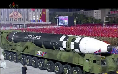 This image made from video broadcasted by North Korea's KRT, shows a military parade with what appears to be possible new intercontinental ballistic missile at the Kim Il Sung Square in Pyongyang, Saturday, Oct. 10, 2020. (KRT via AP)