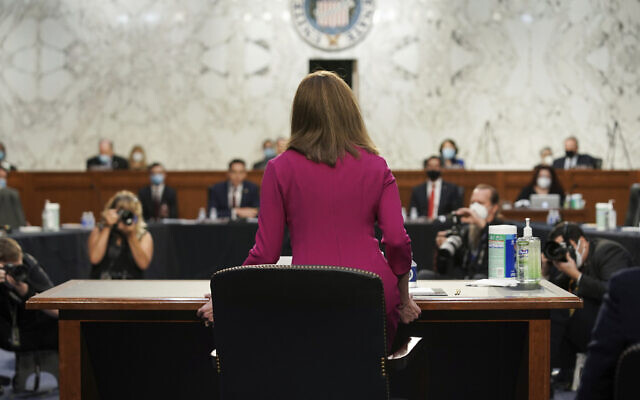US Supreme Court nominee Amy Coney Barrett arrives for her Senate Judiciary Committee confirmation hearing before the Senate Judiciary Committee on Capitol Hill, in Washington, October 12, 2020. (Greg Nash/Pool via AP) US Supreme Court nominee Amy Coney Barrett arrives for her Senate Judiciary Committee confirmation hearing before the Senate Judiciary Committee on Capitol Hill, in Washington, October 12, 2020. (Greg Nash/Pool via AP)