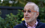 Paul R. Milgrom, professor at Stanford University, during an interview about winning the Nobel Prize in economics at his home in Palo Alto, California, October 12, 2020. (AP Photo/Tony Avelar)