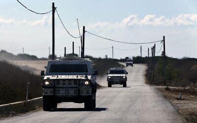 UN peacekeeping military vehicles patrol near the post where the indirect talks between Israel and Lebanon were being held in the southern Lebanese border town of Naqoura, Lebanon, October 14, 2020. (Bilal Hussein/AP)