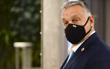 Hungary's Prime Minister Viktor Orban leaves the building during departures at the end of an EU summit in Brussels, on October 16, 2020. (Johanna Geron, Pool via AP)