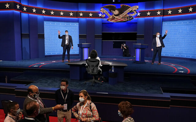 Mock debaters perform onstage as preparations take place for the second US Presidential debate at Belmont University, Wednesday, Oct. 21, 2020, in Nashville, Tenn. (AP Photo/Patrick Semansky) Mock debaters perform onstage as preparations take place for the second US Presidential debate at Belmont University, Wednesday, Oct. 21, 2020, in Nashville, Tenn. (AP Photo/Patrick Semansky)