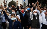 Demonstrators chant slogans during an anti-France protest in Istanbul, October 25, 2020. (AP Photo/Emrah Gurel)