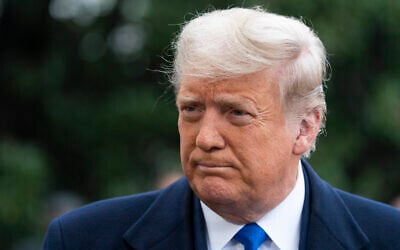 US President Donald Trump speaks with reporters as he walks to Marine One on the South Lawn of the White House, October 27, 2020, in Washington. (Alex Brandon/AP)