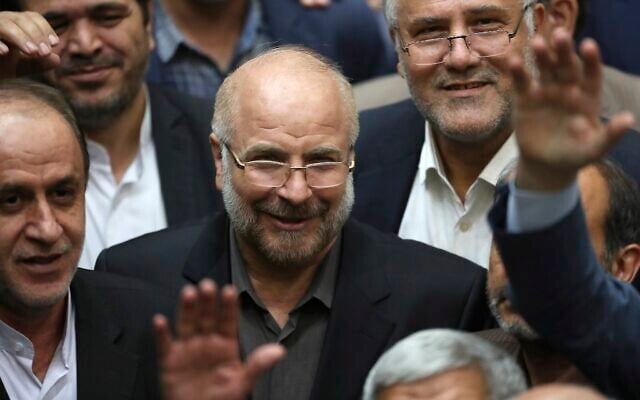 In this May 28, 2020, photo, Mohammad Bagher Qalibaf, center, is surrounded by lawmakers after being elected as speaker of the parliament, in Tehran, Iran. (AP Photo/Vahid Salemi) In this May 28, 2020, photo, Mohammad Bagher Qalibaf, center, is surrounded by lawmakers after being elected as speaker of the parliament, in Tehran, Iran. (AP Photo/Vahid Salemi)