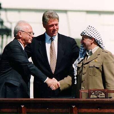 (L-R) Prime Minister Yitzhak Rabin, US President Bill Clinton, and PLO Chairman Yasser Arafat, at the Oslo Accords signing ceremony on September 13, 1993. (Wikipedia)