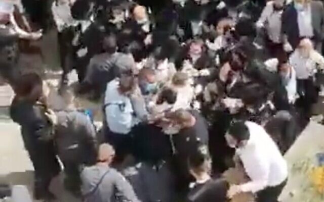 Screen capture from video of clashes between police and the ultra-Orthodox community in the settlement of Beitar Illit, October 4, 2020. (Twitter) Screen capture from video of clashes between police and the ultra-Orthodox community in the settlement of Beitar Illit, October 4, 2020. (Twitter)
