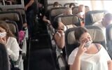 Screen capture from video of passengers on an El Al flight to Athens that failed to take off due to engine trouble, October 1, 2020. (Ynet news)