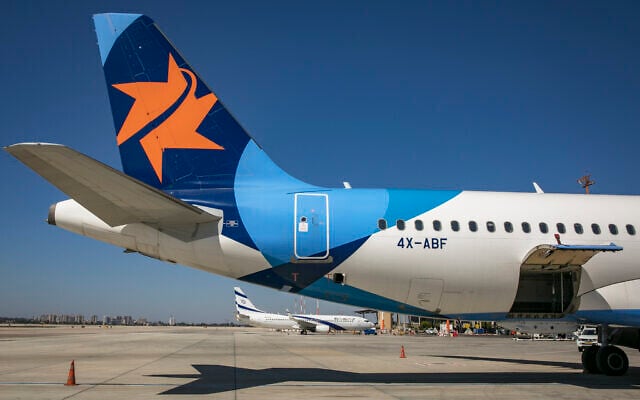 Illustrative: Parked airplanes belonging to Israir and El Al at Ben Gurion International Airport, August 8, 2020. (Olivier Fitoussi/FLASH90)
