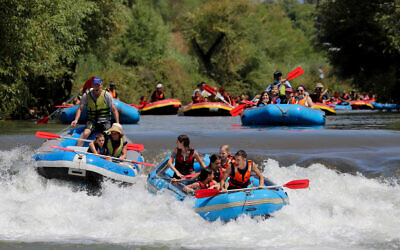 People kayaking in the Jordan river in northern Israel on August 27, 2020. (Yossi Aloni/Flash90)