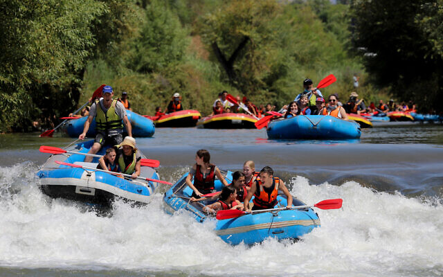 People kayaking in the Jordan river in northern Israel on August 27, 2020. (Yossi Aloni/Flash90)