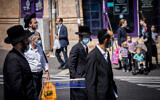 Illustrative: Ultra-Orthodox Jews in the Jerusalem neighborhood of Mea Shearim on October 2, 2020. (Yonatan Sindel/Flash90)